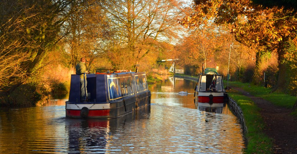 Narrow boats on the Llangollen canal, at Wrenbry boats and reflections in Autumn